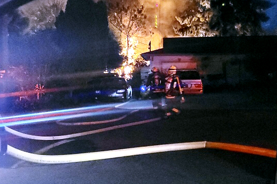A private autobody shop at 6213 N.E. 38th St. burned Monday night, along with tall trees and brush along state Highway 500.