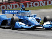 Driver Alex Palou sits second in the IndyCar standings with just the three-race West Coast swing remaining. That swing starts Sunday with the Grand Prix of Portland. (AP Photo/Tom E.