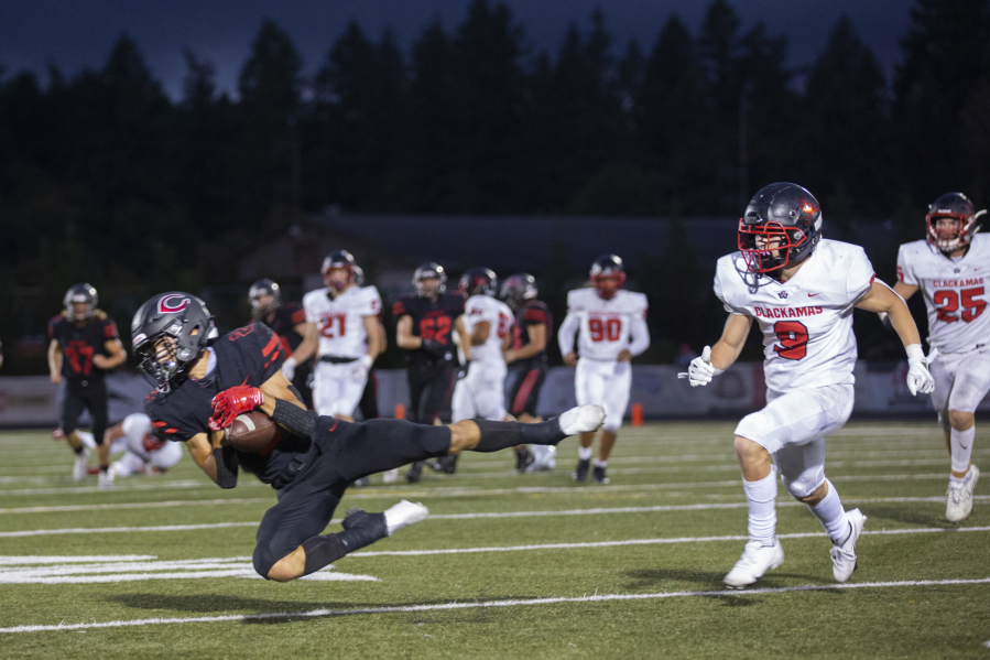 Papermakers Zach Blair makes a catch home opener game against thin the home opener against Clackamas at Doc Harris Stadium on Friday, September 10, 2021.