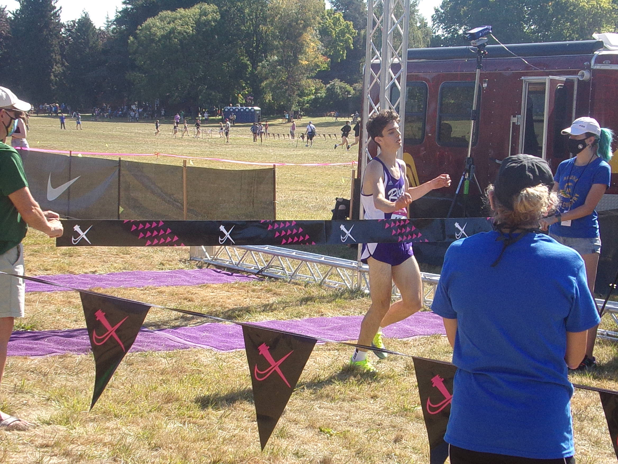 Columbia River's Daniel Barna breaks the finish tape after winning the Division I boys race at the Nike Portland XC meet on Saturday, Sept. 25, 2021 in Fairview, Ore.