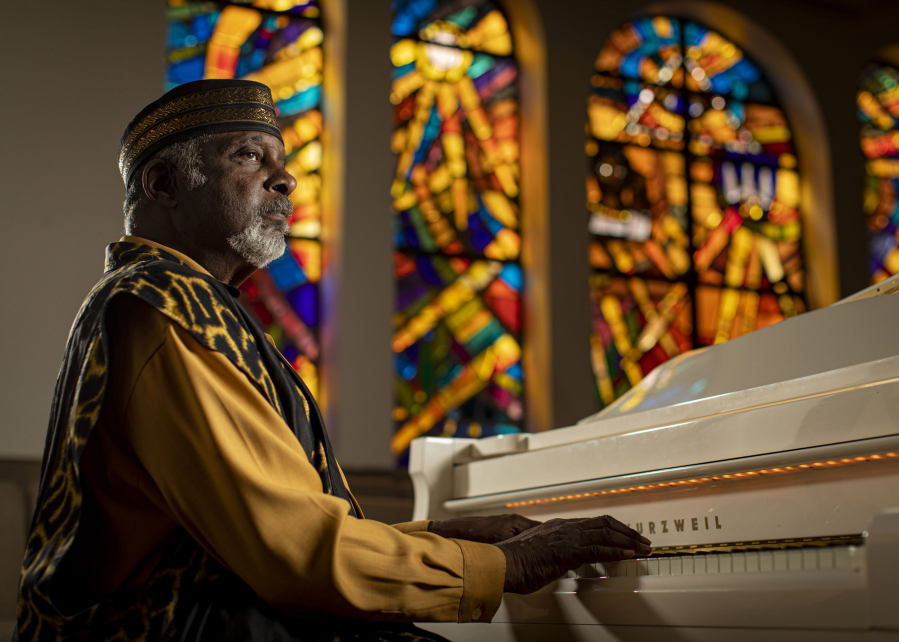 Pastor T.L. Barrett, a Pentecostal minister and a gospel musician, at the piano Sept. 14, in his church, Life Center COGIC, in Chicago's Washington Park neighborhood.