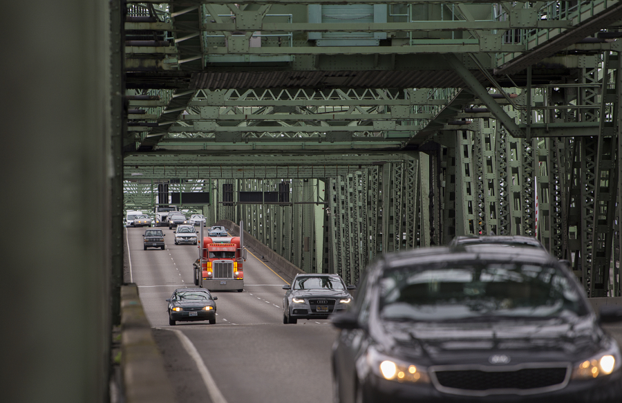 A truck joins other traffic crossing the Interstate 5 Bridge while traveling north on I-5 on Jan. 7, 2020.