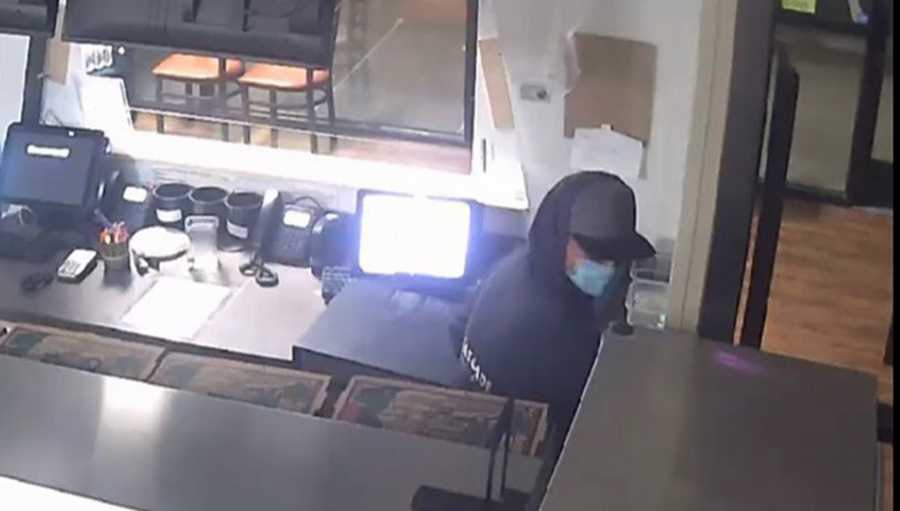 Vancouver police are investigating a break-in early Monday morning at Champ Pizza in east Vancouver. The store's video surveillance captured the burglar.