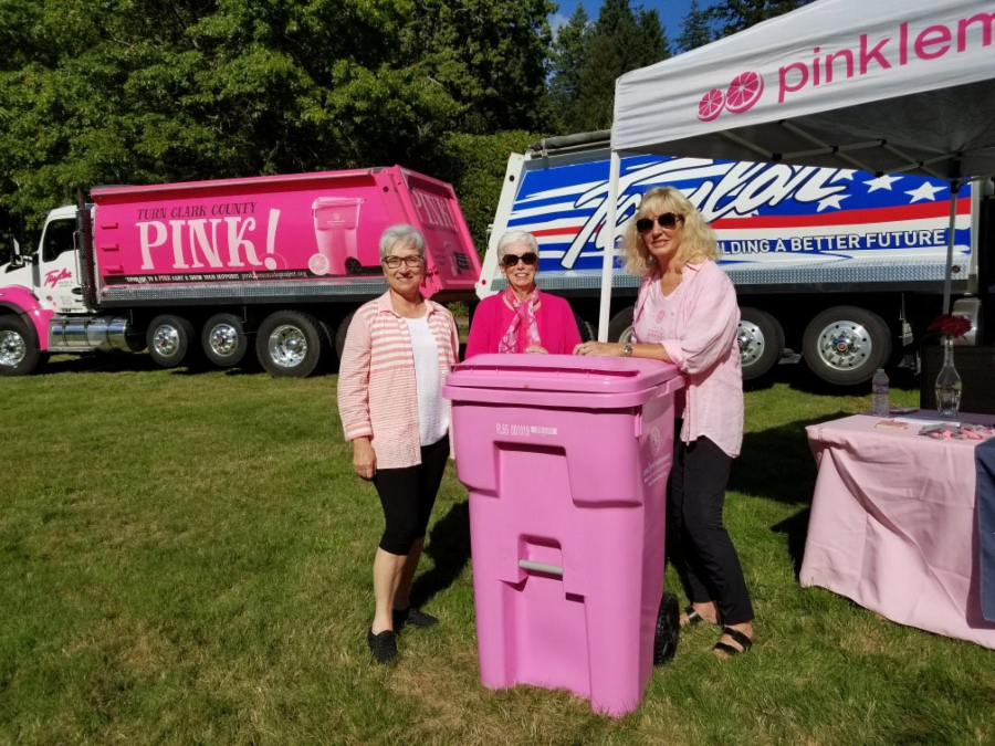 Sherry Stose, left, Mary Frances Duggan and Jeanne Firstenburg with a pink Waste Connections recycling bin that supports the Pink Lemonade Project. A new pink Taylor Transport Inc. truck supporting the nonprofit made its debut at a recent cruise-in event at Alderbrook Park in Hockinson.