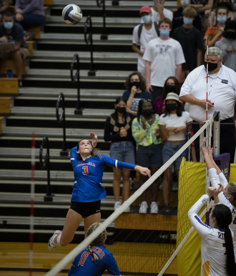 Ridgefield junior hitter Paige Stepaniuk loads up for an attack during the 2A Greater St. Helens League volleyball match on Tuesday at Columbia River High School. The Spudders won 3-0.