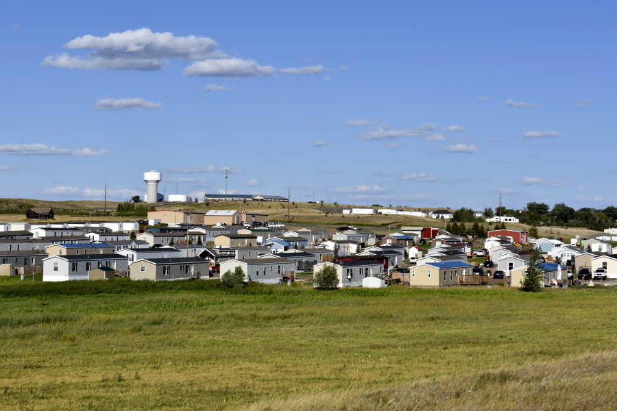 A housing development sits in Aug. 24, 2021, in Watford City, N.D., part of McKenzie County, the fastest-growing county in the U.S. That's according to new figures from the Census Bureau.