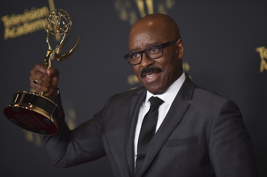 Courtney B. Vance poses with the award for outstanding guest actor in a drama series for "Lovecraft Country" on night two of the Creative Arts Emmy Awards on Sunday, Sept. 12, 2021, in Los Angeles.