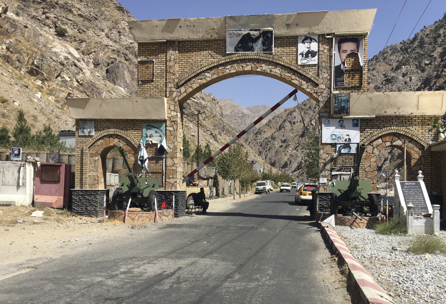 A Taliban soldier guards the Panjshir gate in Panjshir province northeastern of Afghanistan, Wednesday, Sept. 8, 2021.