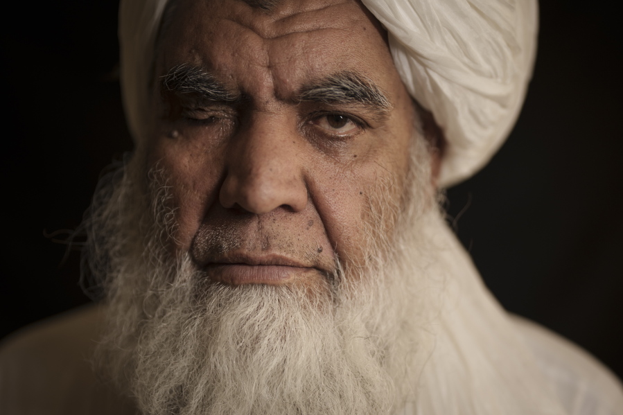 Taliban leader Mullah Nooruddin Turabi poses for a photo in Kabul, Afghanistan, Wednesday, Sept. 22, 2021. Mullah Turabi, one of the founders of the Taliban, says the hard-line movement will once again carry out punishments like executions and amputations of hands, though perhaps not in public.