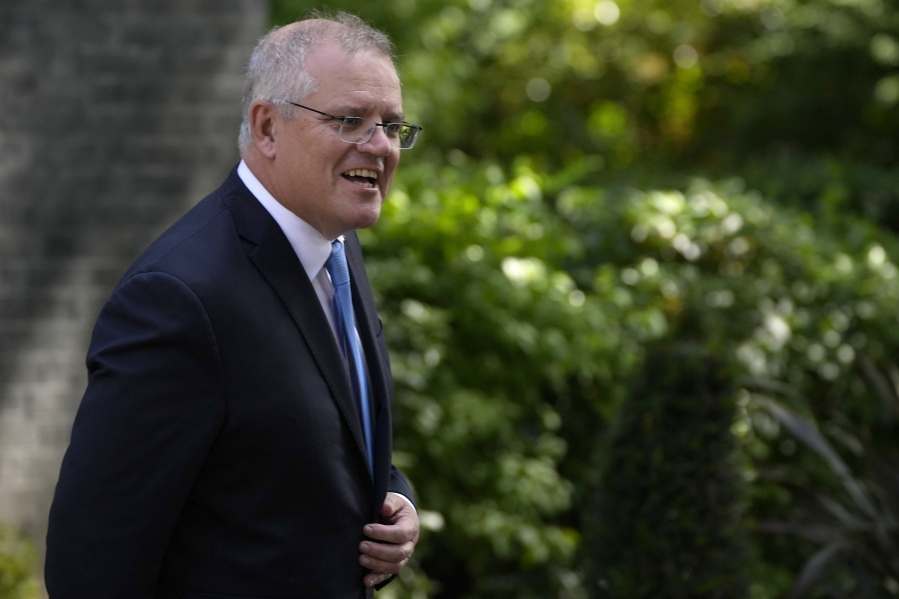 FILE - In this June 15, 2021, file photo, Australia's Prime Minister Scott Morrison leaves after meeting with Britain's Prime Minister Boris Johnson at 10 Downing Street, in London. France would have known Australia had "deep and grave concerns" that a submarine fleet the French were building would not meet Australian needs, Prime Minister Morrison said on Sunday, Sept.
