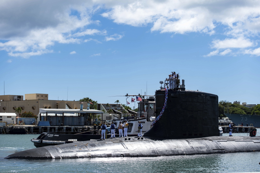 The Virginia-class fast-attack submarine USS Illinois returns home to Joint Base Pearl Harbor-Hickam from a deployment on Sept. 13. Australia has decided to invest in U.S. nuclear-powered submarines and dump its contract with France to build diesel-electric submarines. (u.s.