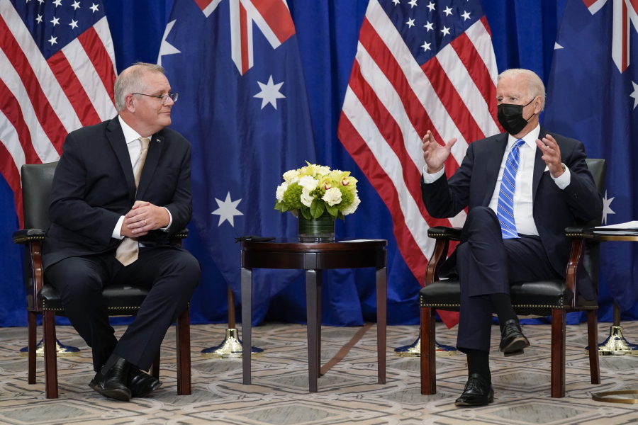 FILE - In this Sept. 21, 2021, file photo President Joe Biden meets with Australian Prime Minister Scott Morrison at the Intercontinental Barclay Hotel during the United Nations General Assembly in New York. Biden is set to host the first ever in-person gathering of leaders of the Indo-Pacific alliance known as "the Quad" on Friday, wrapping up a tough week of diplomacy in which he faced no shortage of criticism from both allies and adversaries.