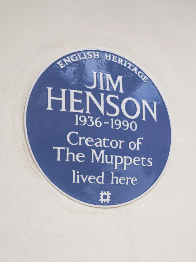 In this undated photo provided by English Heritage a view of the blue plaque on the former London home of Jim Henson, creator of The Muppets, who has been honoured with a blue plaque.  The American creator of the Muppets was honored Tuesday, Sept, 7, 2021 in Britain with a blue plaque at his former home in north London, which he bought after 'The Muppet Show' was commissioned for British television -- 50 Downshire Hill in Hampstead in north London to be precise.