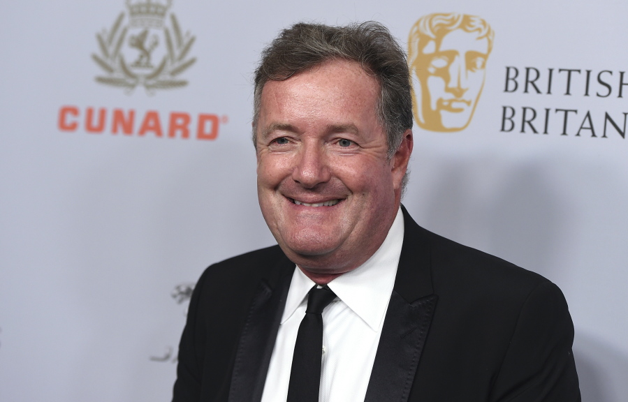 FILE - In this Friday, Oct. 25, 2019 file photo, Piers Morgan arrives at the BAFTA Los Angeles Britannia Awards at the Beverly Hilton Hotel on  in Beverly Hills, Calif. British presenter Piers Morgan will join News Corp and Fox News Media and host a TV show that will air in the U.S., Britain and Australia, the company said Thursday Sept. 16, 2021.