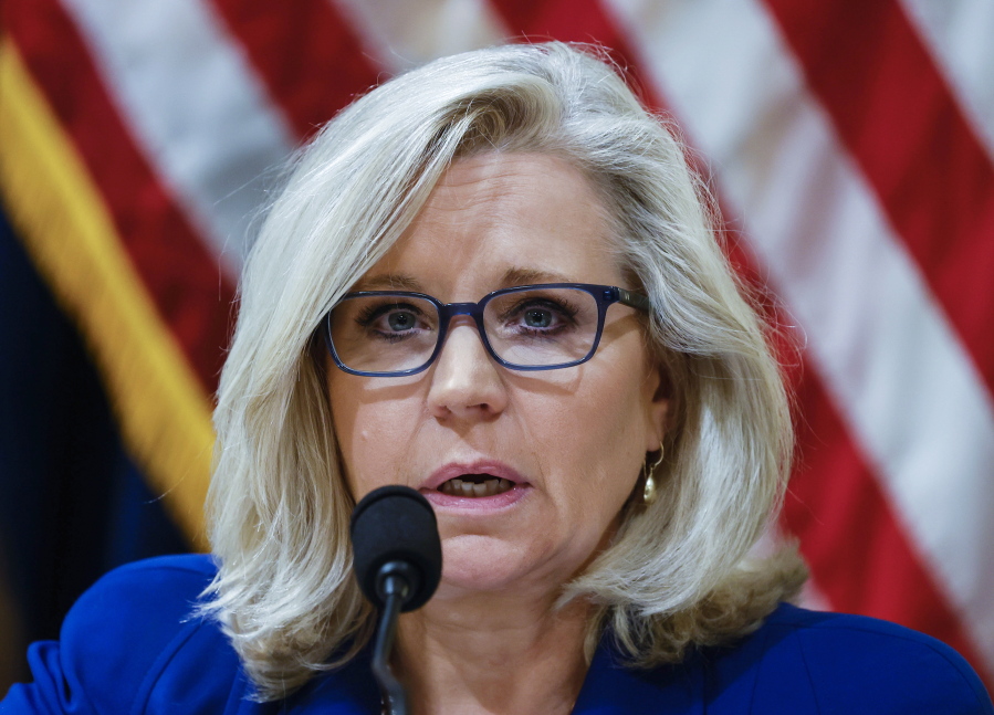 FILE - In this July 27, 2021 file photo, Rep. Liz Cheney, R-Wy., listens to testimony from Washington Metropolitan Police Department Officer Daniel Hodges during the House select committee hearing on the Jan. 6 attack on Capitol Hill in Washington.  House Democrats have promoted Republican Rep. Liz Cheney to vice chairwoman of a committee investigating the Jan. 6 Capitol insurrection. They're placing Cheney in a leadership spot on the panel as some members of the GOP caucus are threatening to oust her for participating. Cheney is a fierce critic of former President Donald Trump and has remained defiant amid the criticism from her own party.
