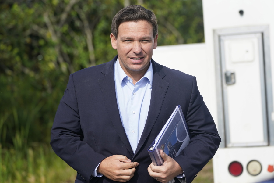FILE - In this Tuesday, Aug. 3, 2021, file photo, Florida Gov. Ron DeSantis arrives at a news conference, near the Shark Valley Visitor Center in Miami. On Sunday, Sept. 12, three Republican presidential prospects, including DeSantis, sharply condemned President Joe Biden's handling of the end of the war in Afghanistan, rebuking the administration's conduct of the U.S. withdrawal as weak and as emboldening its adversaries.