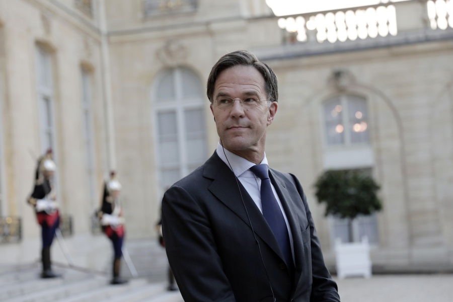 FILE - In this Tuesday, Aug. 31, 2021 file photo, Dutch Prime Minister Mark Rutte looks on at the Elysee Palace in Paris. As Europe's economic powerhouse Germany embarks on the task of piecing together a new ruling coalition after the knife-edge election on Sunday Sept. 26, 2021, the country need only look to its neighbors, Belgium and the Netherlands, to see how tricky the process can be. Dutch political leaders resumed meetings this week -- again -- in a bid to find a constellation of parties willing to rule the country for the next four years. They've been at it -- on and off -- for more than six months now and no end is in sight.