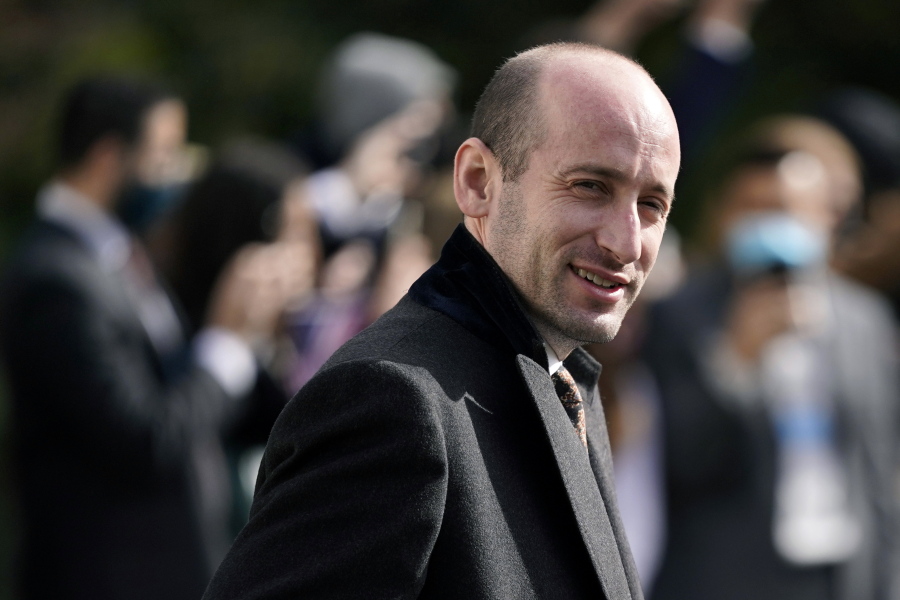 FILE - In this Oct. 30, 2020, file photo, then-President Donald Trump's White House senior adviser Stephen Miller walks on the South Lawn of the White House in Washington. Tens of thousands of Afghan refugees fleeing the Taliban are arriving in the U.S., and a handful of former Trump administration officials are working to turn Republicans against them.