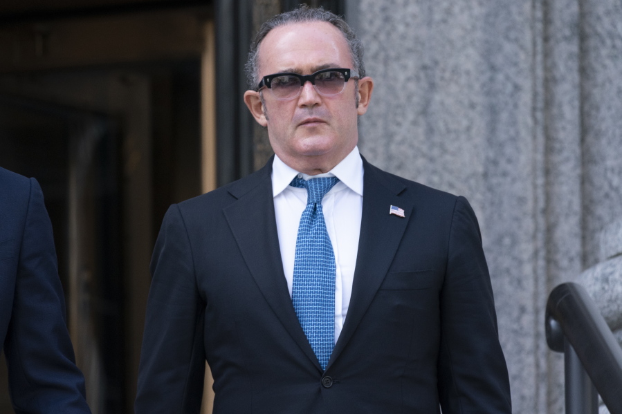 Igor Fruman leaves in Federal court in Manhattan, Friday, Sept. 10, 2021. The Soviet-born Florida businessman who helped Rudy Giuliani seek damaging information about Joe Biden in Ukraine when Biden was running for president pleaded guilty in a case involving illegal campaign contributions.