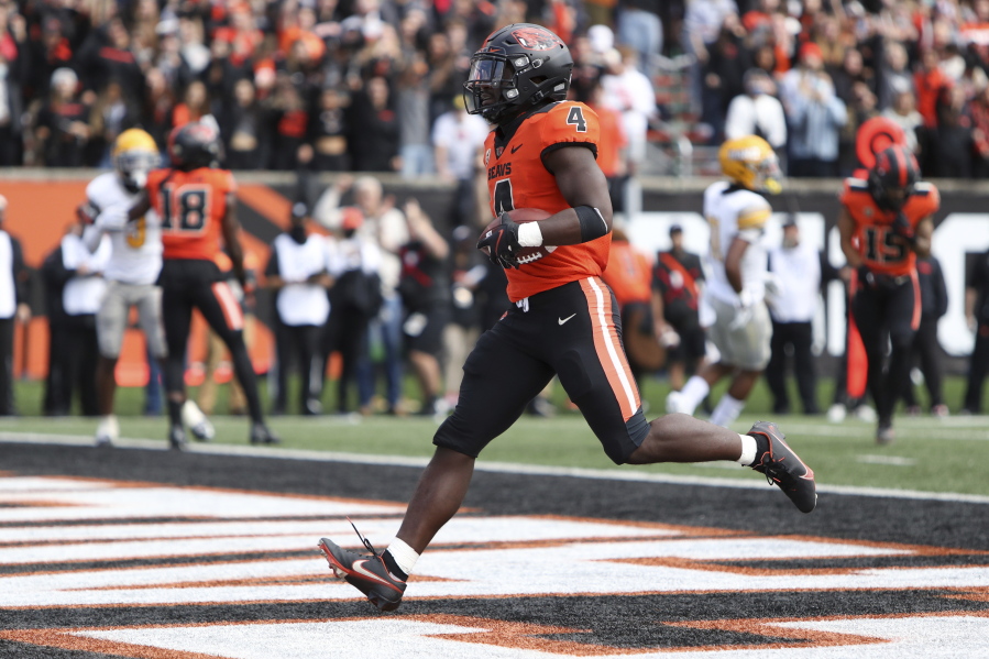 Oregon State running back B.J. Baylor (4) strides in to the end zone for a touchdown during the first half of an NCAA college football game against Idaho on Saturday, Sept. 18, 2021, in Corvallis, Ore.