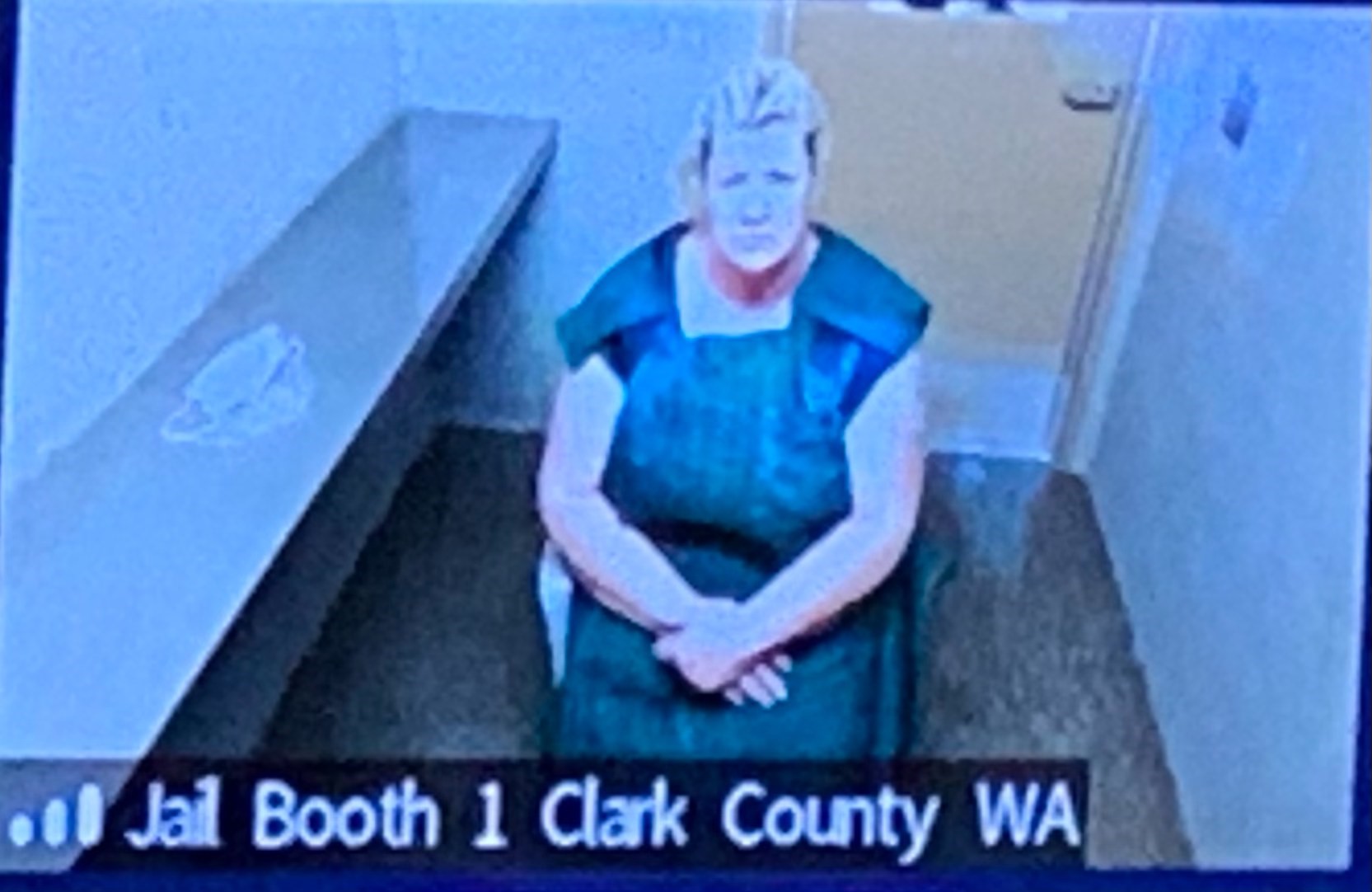 Lani Kraabell, 48, of Winlock makes a first appearance Monday morning, Sept. 13, 2021, in Clark County Superior Court on suspicion of second-degree murder, possession of a stolen firearm and second-degree unlawful possession of a firearm. She is accused of facilitating the sale of stolen firearms linked to an undercover investigation that led to the fatal shooting of Clark County sheriff's Detective Jeremy Brown.