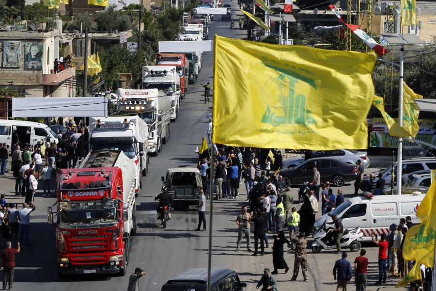 A convoy of tanker trucks carrying Iranian diesel crossed the border from Syria into Lebanon, arrive at the eastern town of el-Ain, Lebanon, Thursday, Sept. 16, 2021. The delivery, organized by the Iranian-backed Hezbollah group, violates U.S. sanctions imposed on Tehran after former President Donald Trump pulled America out of a nuclear deal between Iran and world powers three years ago.