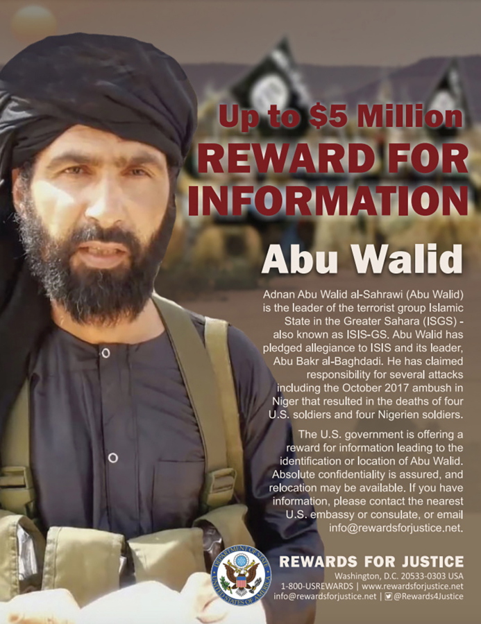 This undated image provided by Rewards For Justice shows a wanted posted of Adnan Abu Walid al-Sahrawi, the leader of Islamic State in the Greater Sahara. French President Emmanuel Macron announced the death of al-Sahrawi Wednesday, Sept. 15, 2021, calling the killing "a major success" for the French military after more than eight years fighting extremists in the Sahel. Macron tweeted that al-Sahrawi "was neutralized by French forces" but gave no further details.