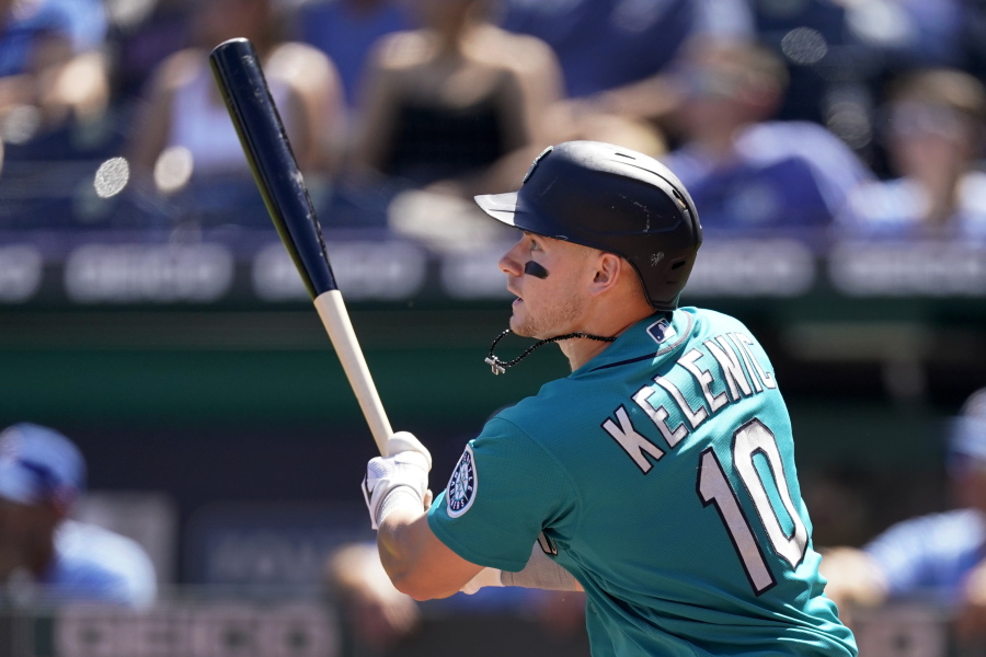 Seattle Mariners' Jarred Kelenic hits a two-run double during the first inning of a baseball game against the Kansas City Royals Sunday, Sept. 19, 2021, in Kansas City, Mo.