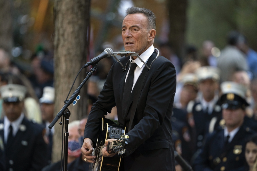FILE - In this Saturday, Sept. 11, 2021, file photo, Bruce Springsteen performs during ceremonies to commemorate the 20th anniversary of the 9/11 terrorist attacks, at the National September 11 Memorial & Museum in New York. Springsteen's most memorable artifacts including his favorite Fender guitar and stage outfits will be on display in a traveling interactive exhibit. The Grammy Museum announced Tuesday, Sept. 14, 2021, that Bruce Springsteen Live! will open at the Grammy Museum Experience in the Prudential Center in Newark, New Jersey, on Oct. 1.