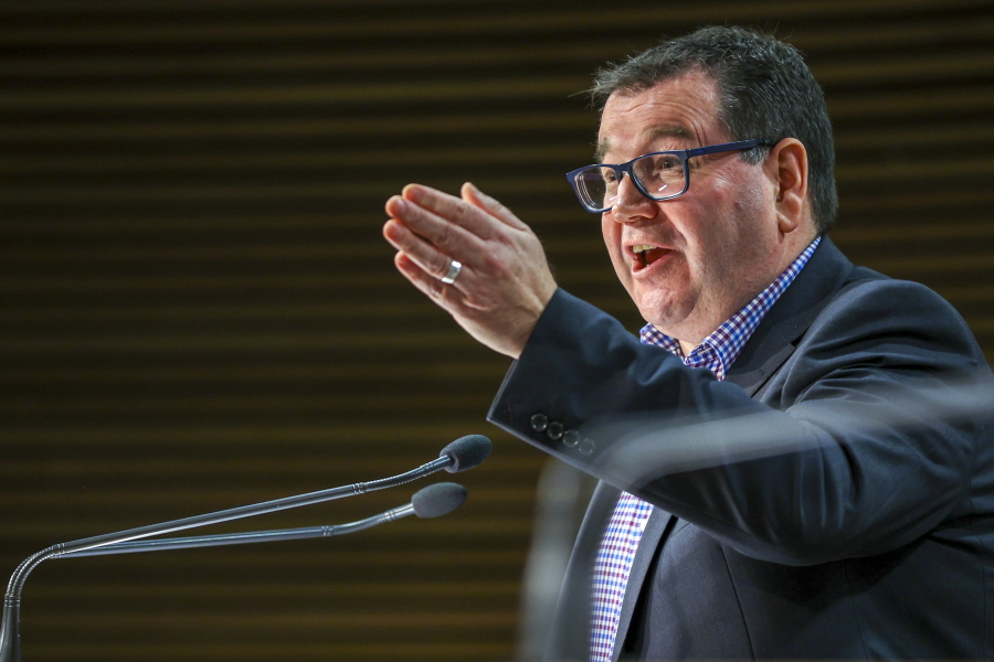 New Zealand's Deputy Prime Minister Grant Robertson speaks to media during a news conference at Parliament in Wellington, New Zealand, Sunday, Sept. 5, 2021. New details emerged Sunday about how an extremist inspired by the Islamic State group was able to remain in New Zealand despite his fraudulent refugee application and alarming behavior.