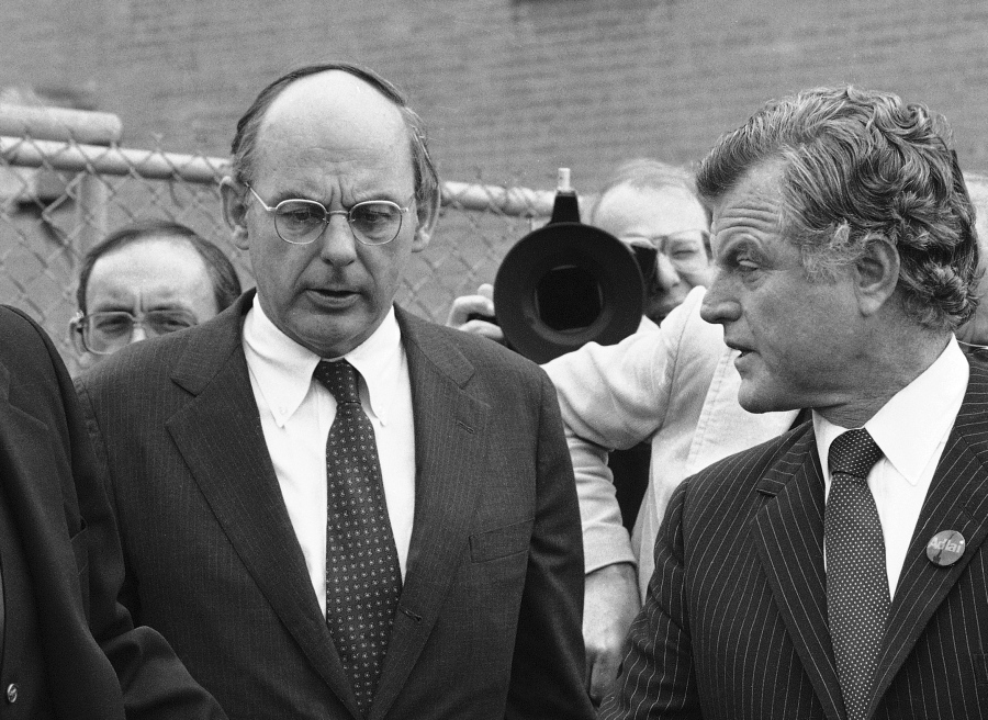 FILE - In this Oct. 14, 1982, file photo, Illinois Democratic gubernatorial candidate Adlai Stevenson III, left, talks with Sen. Edward Kennedy, right, talk as they finish a series of appearances in Chicago. Stevenson III, of Illinois, has died at his home on Chicago's North Side. He was 90. On Tuesday, Sept. 7, 2021, his son Adlai Stevenson IV confirmed the Democrat's death and said his father had dementia.