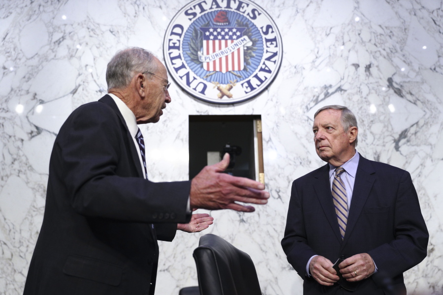 Senate Judiciary Committee Ranking Member Sen. Chuck Grassley, R-Iowa, left, speaks with Chairman Sen. Dick Durbin, D-Ill., prior to a Senate Judiciary Committee hearing to examine Texas's abortion law, Wednesday, Sept. 29, 2021 on Capitol Hill in Washington.
