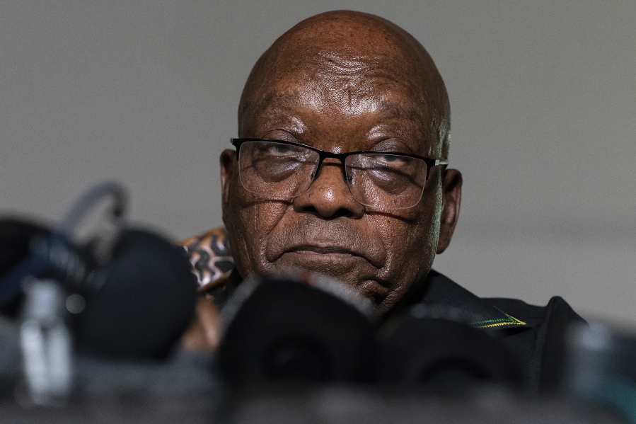 FILE - In this Sunday, July 4, 2021 file photo, former President Jacob Zuma addresses the press at his home in Nkandla, KwaZulu-Natal Province, South Africa. Zuma has been granted medical parole, after serving two months of a 15-month sentence for contempt of court.