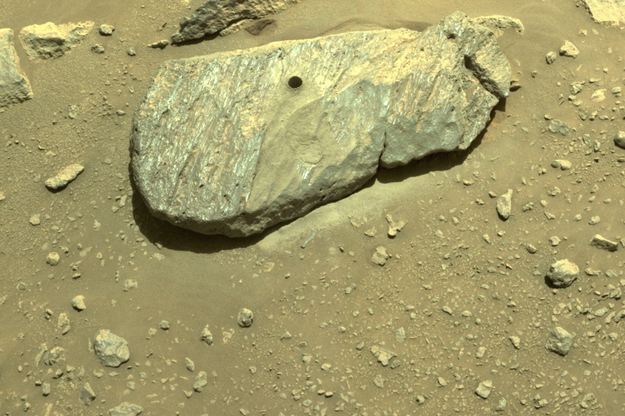 This Sept. 1, 2021 image provided by NASA shows the hole drilled by the Perseverance rover during its second sample-collection attempt in Mars' Jezero Crater.
