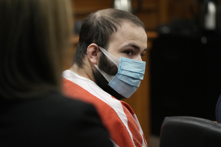 Ahmad Al Aliwi Alissa, accused of killing 10 people at a Colorado supermarket in March, listens during a hearing Tuesday, Sept. 7, 2021, in Boulder, Colo. A judge has ordered a state mental health evaluation for Alissa to determine if he is competent to stand trial.