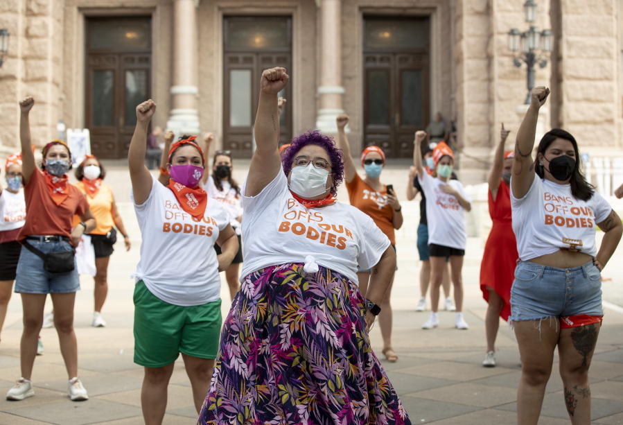 FILE - In this Wednesday, Sept. 1, 2021 file photo, Barbie H. leads a protest against the six-week abortion ban at the Capitol in Austin, Texas. Dozens of people protested the abortion restriction law that went into effect Wednesday.