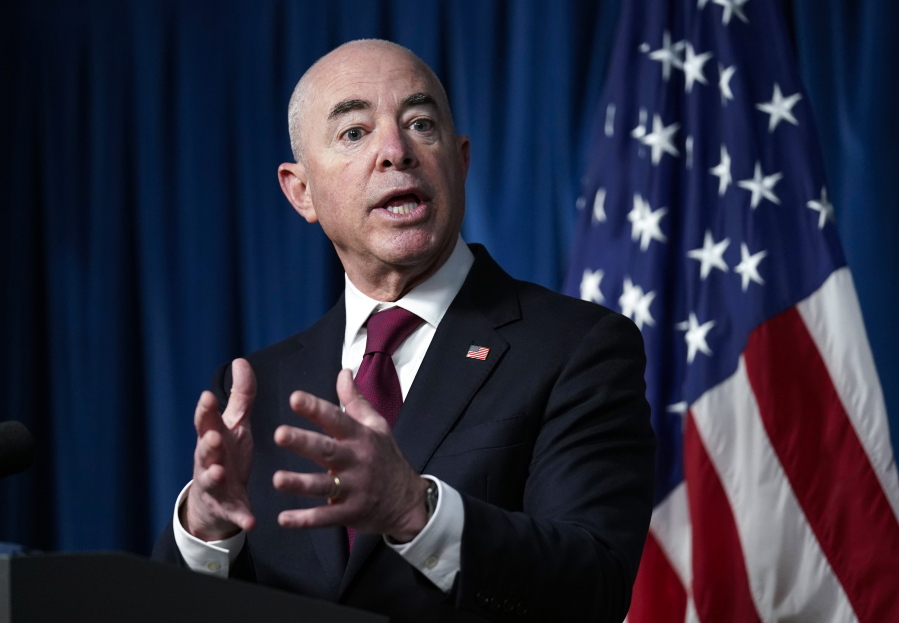 Homeland Security Secretary Alejandro Mayorkas updates reporters on the effort to resettle vulnerable Afghans in the United States, in Washington, Friday, Sept. 3, 2021. (AP Photo/J.