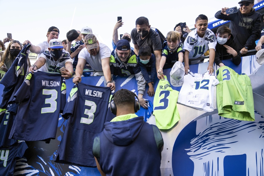 Fans attending most pro sporting events in Seattle will soon be required to show proof they've been vaccinated against COVID-19 or that they've tested negative for the virus. The NFL's Seahawks, MLS's Sounders, NHL's Kraken and the University of Washington all announced updated policies Tuesday, Sept. 7, 2021, for fans attending games this season.