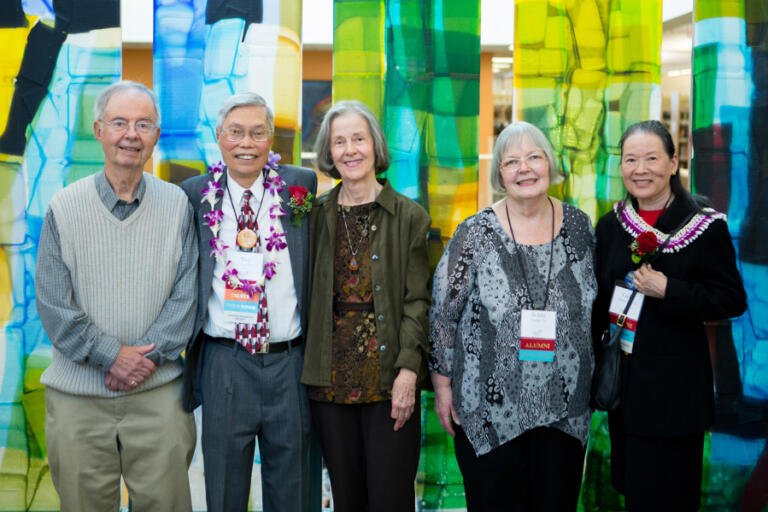 Old friends and colleagues at Pacific University in Forest Grove, Ore., pose with Tim Tran, second from left, and Cathy Tran, far right, after they made a large donation to the university library.