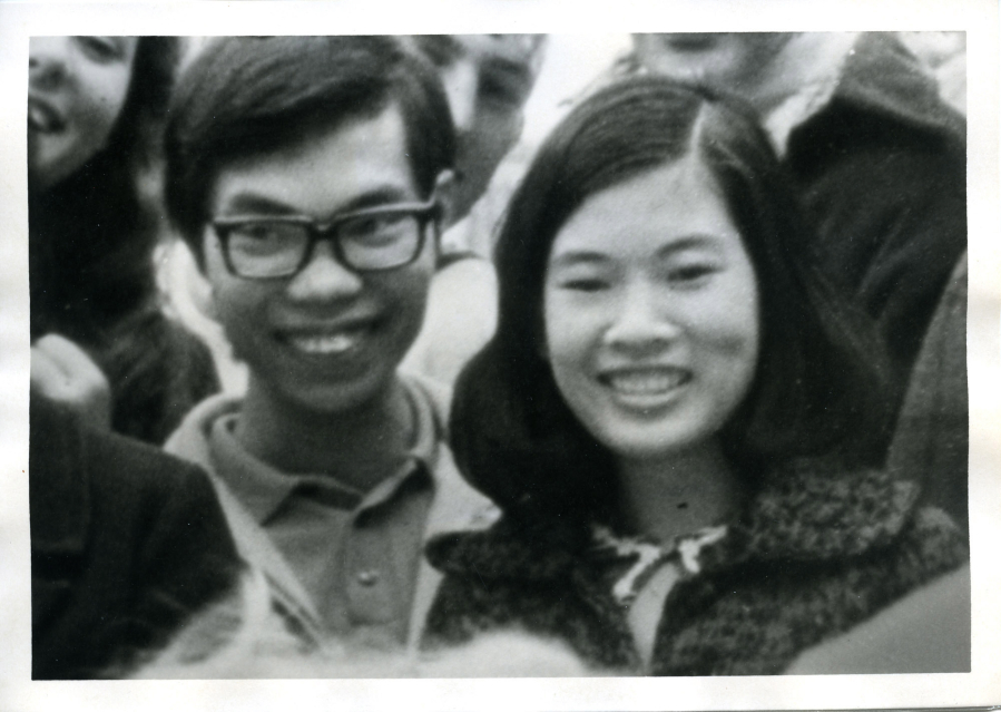 Tim Tran and his wife-to-be, Thuy (now Cathy), enjoy a typical, informal American pleasure at Pacific University in 1971: watching a pie-eating contest.