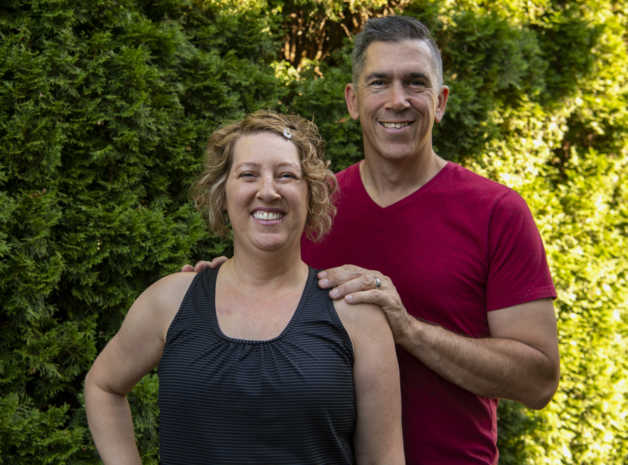 Amy Hawkins and Ben Novinger, here at their Portland home, are part of OHSU's Knight Cancer Institute trial program called Exercising Together.