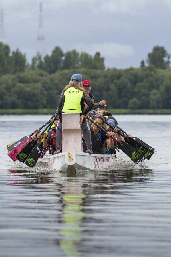 The Catch-22 dragon boat team, which includes a subdivision of breast cancer survivors, practices in August at Vancouver Lake.