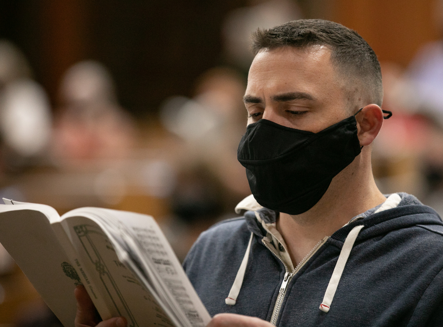Roberto Rodriguez/ for The Columbian
Vancouver Master Chorale member Ryan Allen of Vancouver sings while wearing a face mask designed for singing during rehearsal at First Presbyterian Church. "It feels very different," Allen said. "I can breathe, and I can actually hear my voice going out." (Roberto Rodriguez for The Columbian)