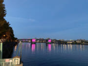 Breast cancer awareness groups turned Portland's Morrison Bridge pink to kick off Breast Cancer Awareness Month.