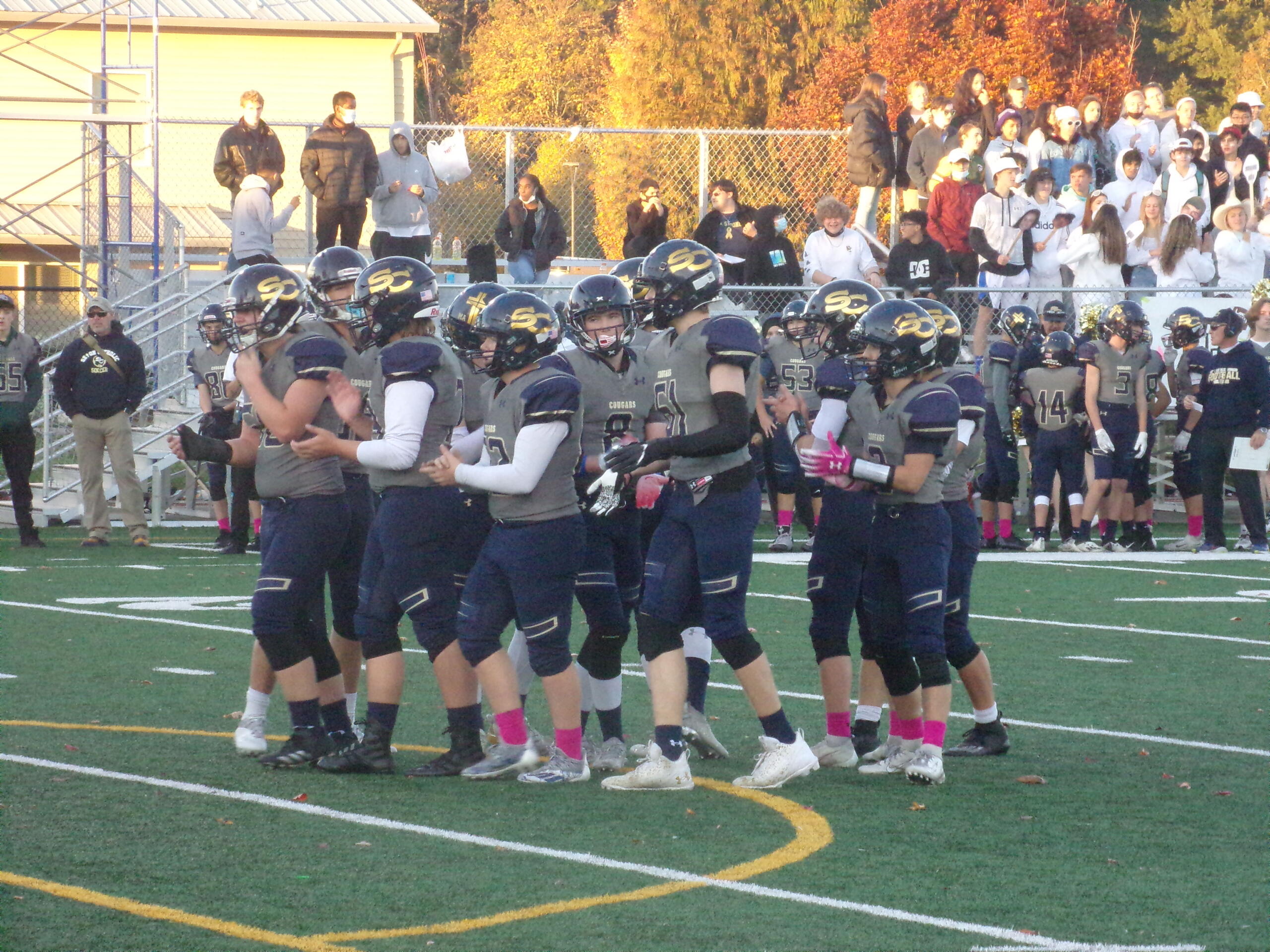 Seton Catholic players break the huddle during the Cougars' 42-8 win over Fort Vancouver on Saturday, Oct.