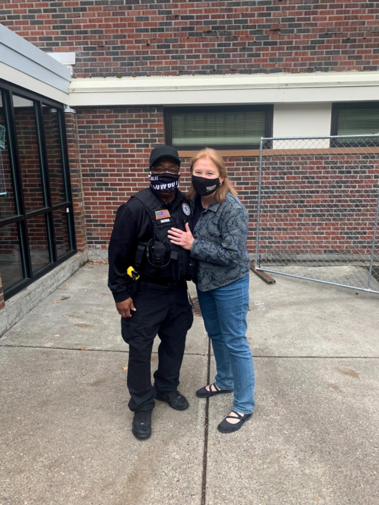 Vancouver Mayor Anne McEnerny-Ogle recently presented Tony Jacobs, a school resource officer at Vancouver School of Arts and Academics, with protein bars that Jacobs has been distributing to students in need for 20 years.