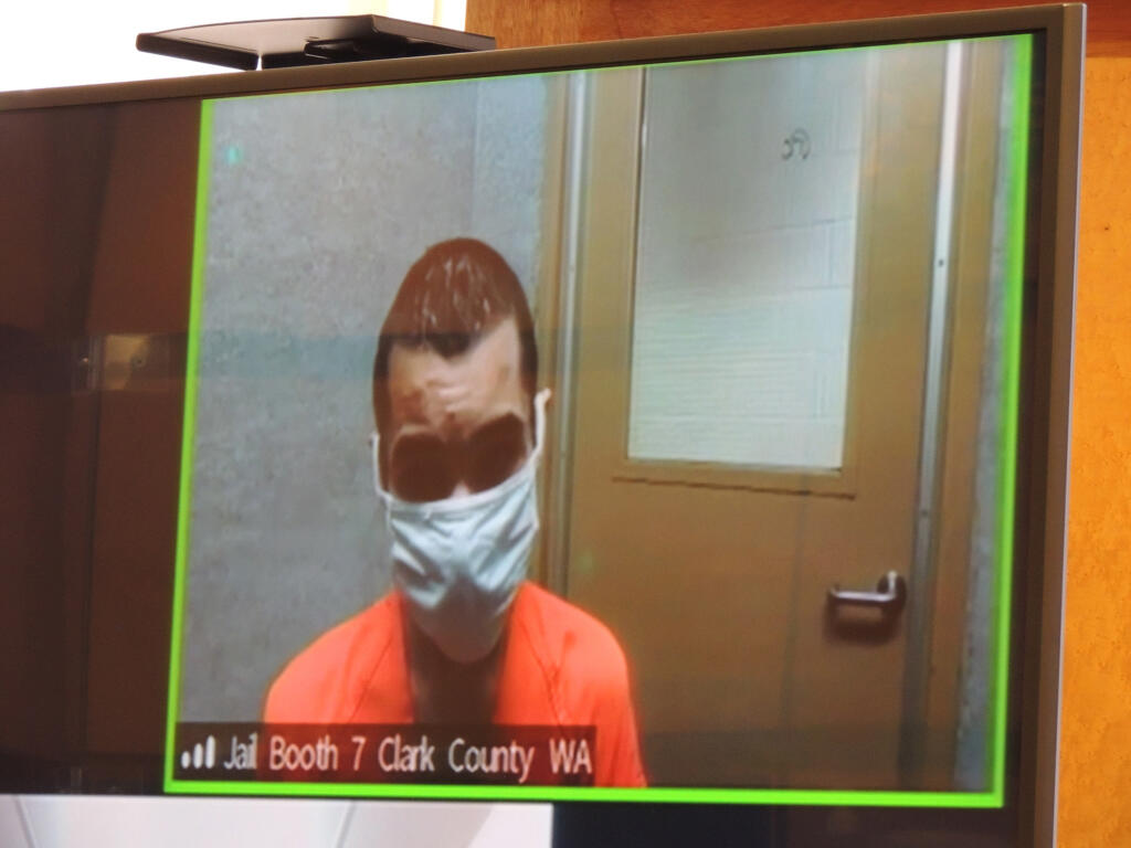 Isaac M Spiekerman, 23, appears in Clark County Superior Court on suspicion of three counts of first-degree assault. Spiekerman is accused of shooting a man in the head during an argument Wednesday morning in Washougal.