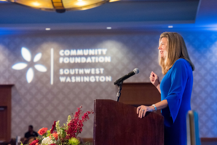 Jennifer Rhoads, president of the Community Foundation for Southwest Washington, speaks during an event. She has announced she will be stepping down from her position.