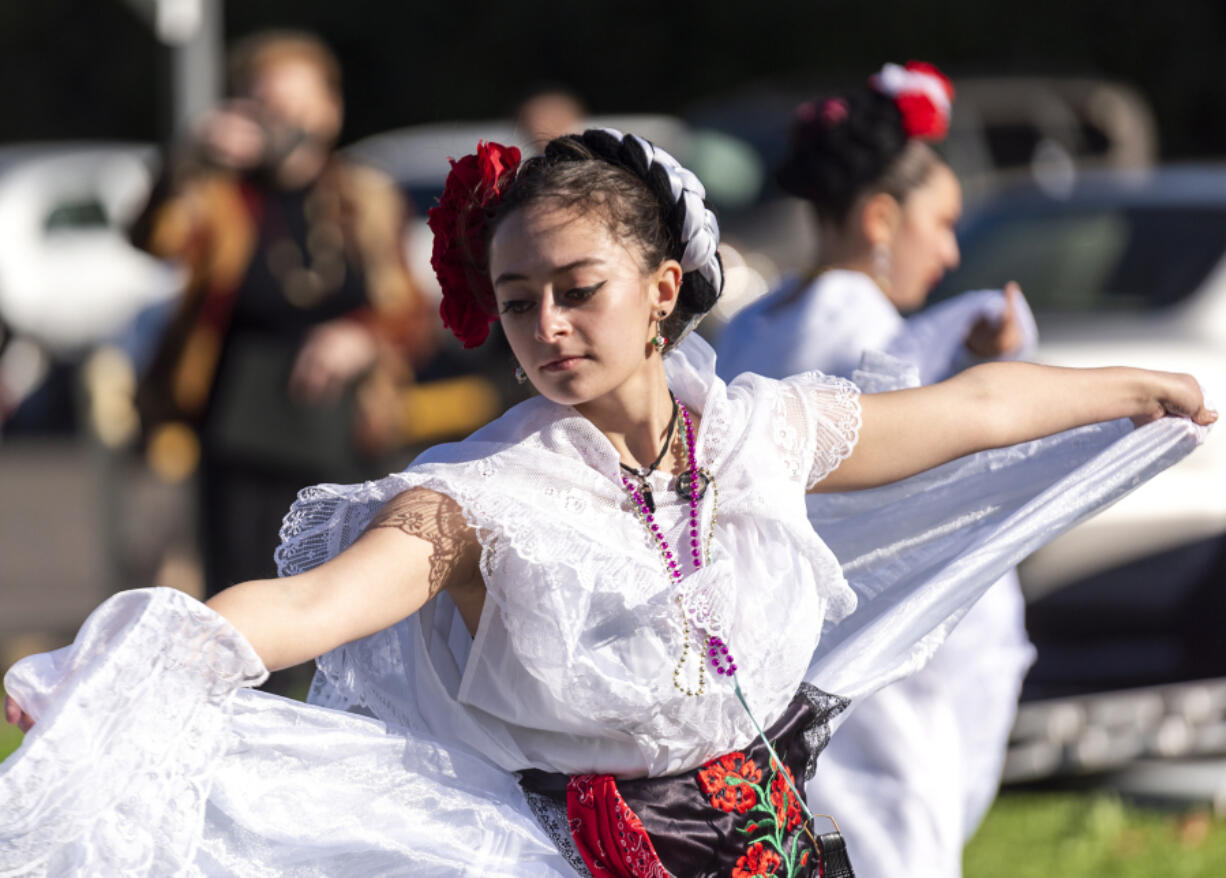 Marianna Cruz dances with other members of Vancouver Ballet Folklorico during a Dia de los Muertos celebration Saturday at River City Church in Vancouver.