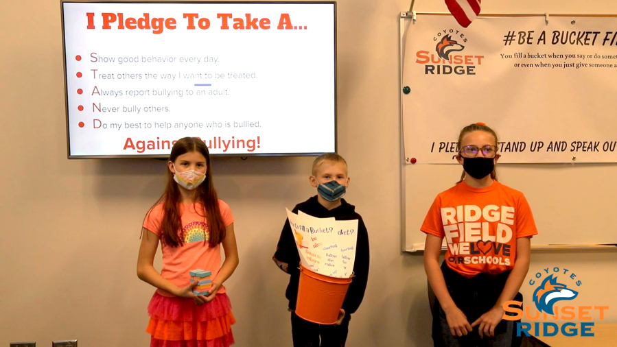 Sunset Ridge Intermediate School Leadership students shared information on the Pledge Posters and the Bucket Brigade.